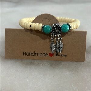 Handmade Turquoise and Cream Wood Bracelet with Feather Charms